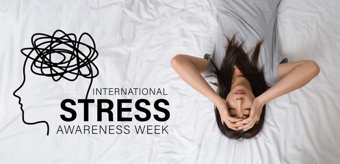 Young Asian woman with suicidal thoughts lying on bed. International Stress Awareness Week