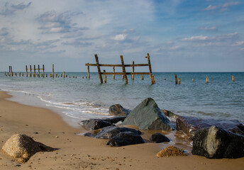 old sea defences on beach