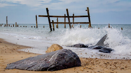old sea defences on beach