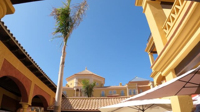 edifios modernos pero construidos con estilos arquitectonicos espa&ntilde;oles en malaga