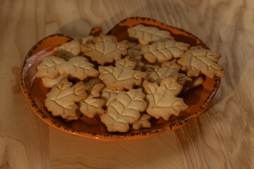 Homemade Autumn Leaf Cookies on an Orange Pumpkin Plate