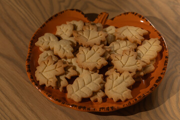 Homemade Autumn Leaf Cookies on an Orange Pumpkin Plate