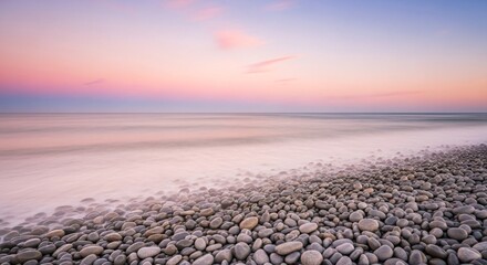 Beach sunset pebble rocks ocean pink sky landscape nature