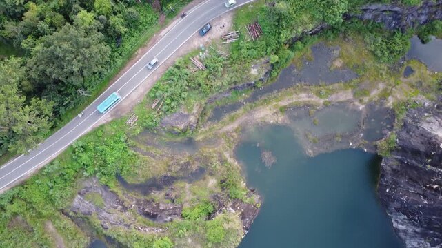 Drone video of capturing multiple lakes and passing through hill in wayanad