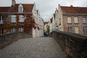 narrow bridge in bruges belgium