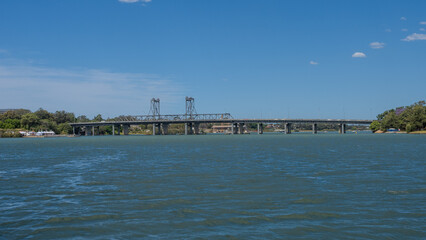 Obraz premium 11 October 2025 steel bridge for trains on Parramatta River Sydney Harbour on a warm spring cloudy overcast day in Sydney NSW Australia