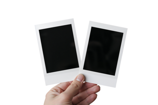 Hand Holding Two Blank Polaroid Frames Mockup