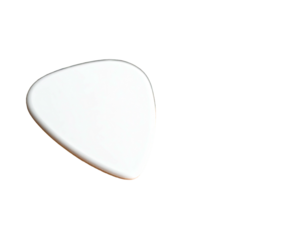 An isolated, pearly white guitar pick against a solid, black background, side lit