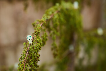 A Whimsical Decoration Set Against Lush Greenery Creates a Captivating, Dreamy Atmosphere