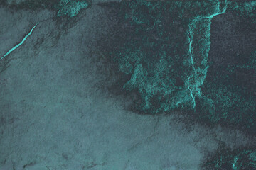 Luxury Plankton glows blue on countertops granite texture