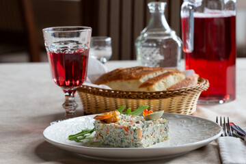 Olivier salad, vinaigrette salad and tartlets. Traditional russian appetizer for celebrating new year eve. Festive table setting.