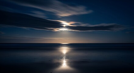 Obraz premium Serene Nightscape - Full Moon Reflecting on Wet Sandy Beach Under Cloudy Sky with Stars and Ocean Waves at Twilight