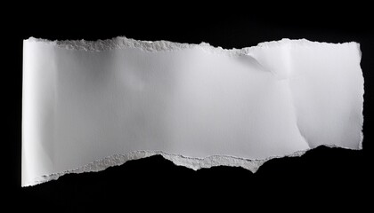 ripped white paper on a black isolated background