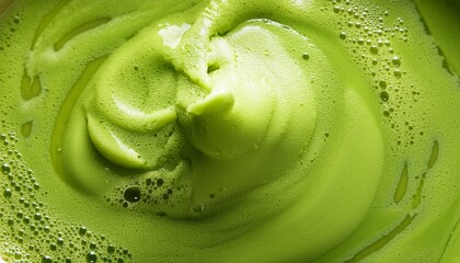 iced matcha background with green frothy texture