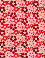 Circles of different tones of red with white dots in the outline resemble berries and make up a vector seamless pattern for postcards, websites, textiles.
