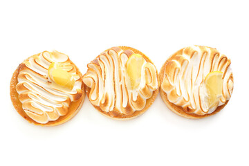 Tasty lemon tartlets on white background