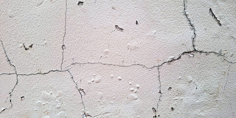 Cracked Concrete Wall With Faded Pink Paint Texture Background