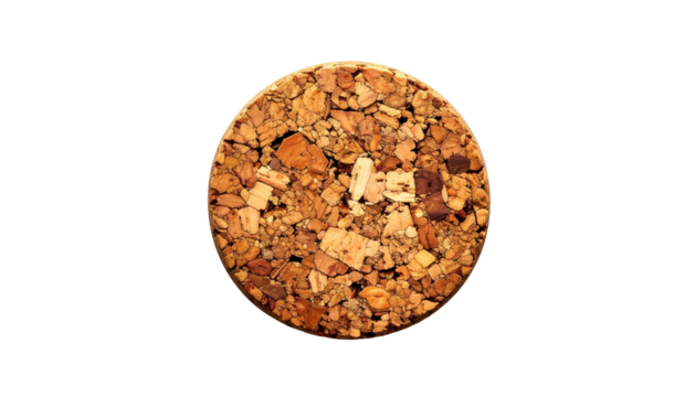 Up-close cork disc from a bottle, isolated on black background