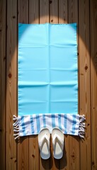 Sunlit Wooden Deck with Beach Towels and Sandals