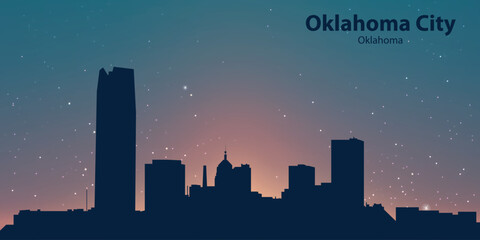 Silhouette of Oklahoma City, Oklahoma, against an evening or morning sky with a gradient from blue to orange. There are also several small white dots imitating stars.