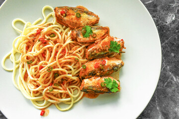 Pasta sardines. Spaghetti with canned sardine with tomato sauce. Spicy noodles. Fusion food.