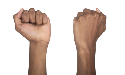 African fist clenched and raised in powerful gesture, symbol of strength, protest, and empowerment,