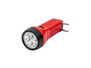 Red plastic pocket torch rechargeable from a wall socket. Flashlight isolated on white background. LED flashlight with dual mode slide switch