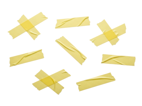 Scattered yellow adhesive tape pieces with lines offering a fun and playful texture for creative projects