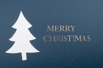 Elegant Blue Christmas Card Design with Hanging Decoration and Holiday Text