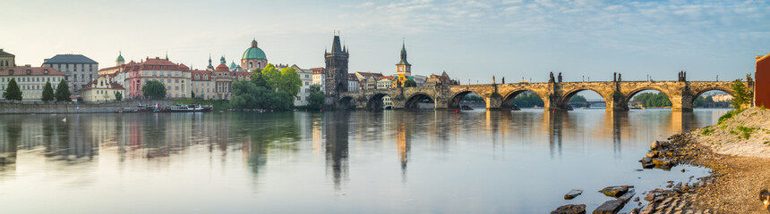 Prague skyline panorama with view of Vltava River and Charles Bridge, Czech Republic