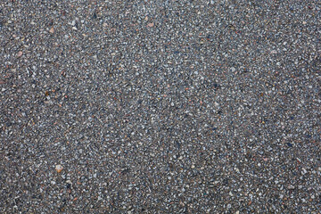 The surface of the used asphalt road.