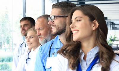 Group of doctors standing at the medical office.