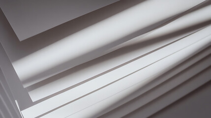 Obraz premium Abstract layered white sheets, captured in a geometric composition. A play of light and shadows accentuates the minimalistic design. #abstractart