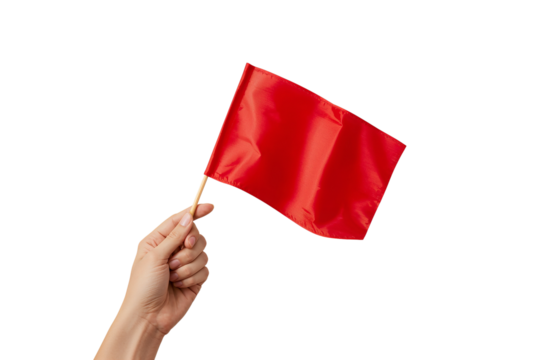 Waving Red Flag held by Caucasian Hand on Isolated Black Backdrop Symbolizing Warning or Alert and Potential Danger for Business Decision Making