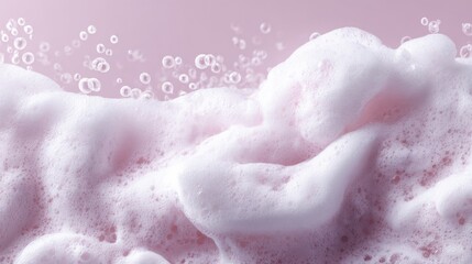 Obraz premium Pink bubbles and foam texture on soft background