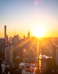 Obraz premium Blurry sunrise over city skyline, golden glow