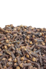 Closeup photo of whole cloves, selective focus.