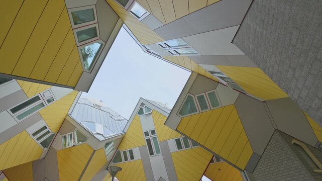 Vibrant Yellow Cube Houses in Rotterdam, a Modern Architectural Marvel and Tourist Attraction in the Netherlands