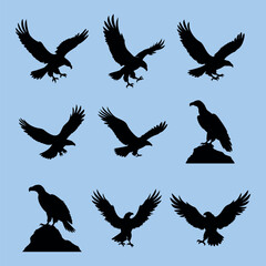 Obraz premium Eagle Silhouettes in Flight and Perched Bird of Prey Vector Set Powerful Wildlife Hunter Symbolism Detailed Feathered Wings and Talons Against Light Blue