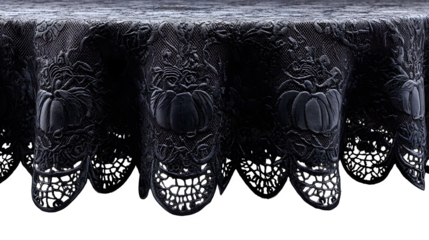 Black lace tablecloth with pumpkin and spider patterns, isolated on white background