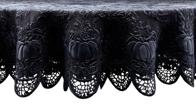 Black lace tablecloth with pumpkin and spider patterns, isolated on white background