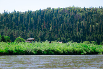 photo of the Ural River. hills and trees around