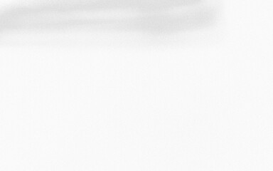 A dark, abstract background with swirling patterns of light and shadow, resembling smoke or fog.