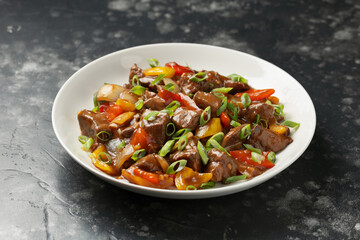 Stir Fry Chinese Pork Liver in a white plate