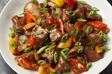 Stir Fry Chinese Pork Liver in a white plate
