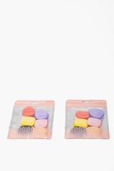 Two bags of assorted pastries are displayed on a white background. The pastries are in various shapes and colors, including pink, yellow, and purple.