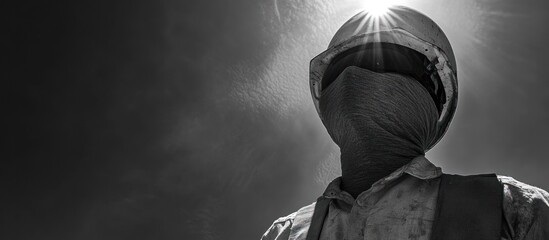 Man in a Helmet Looking Upward