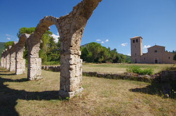 Abbey of San Vincenzo al Volturno, province of Isernia, Molise, Italy and in the foreground what remains of the Portico del Pellegrino