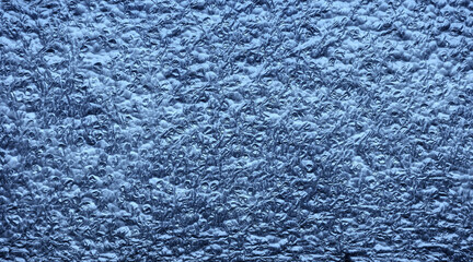 Closeup photo of closed cell polyethylene foam surface, abstract background.