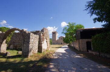 Abbey of San Vincenzo al Volturno, province of Isernia, Molise, Italy and in the foreground what remains of the Portico del Pellegrino